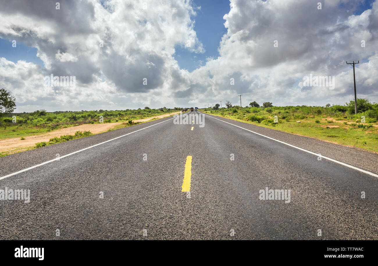 African highway from Mombasa to Nairobi in Kenya, straight asphalt road