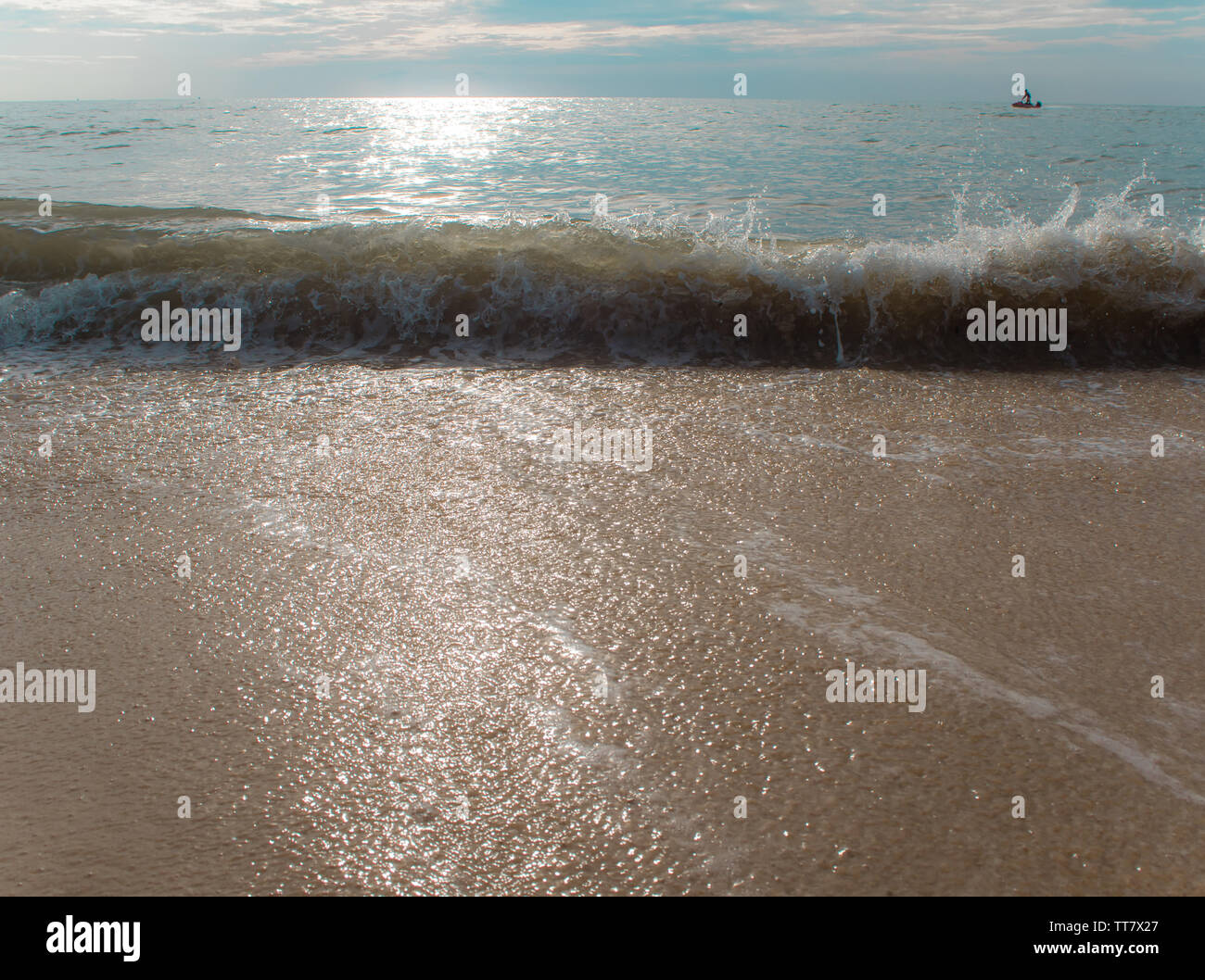 Splash of Sea wave on the beach Stock Photo - Alamy