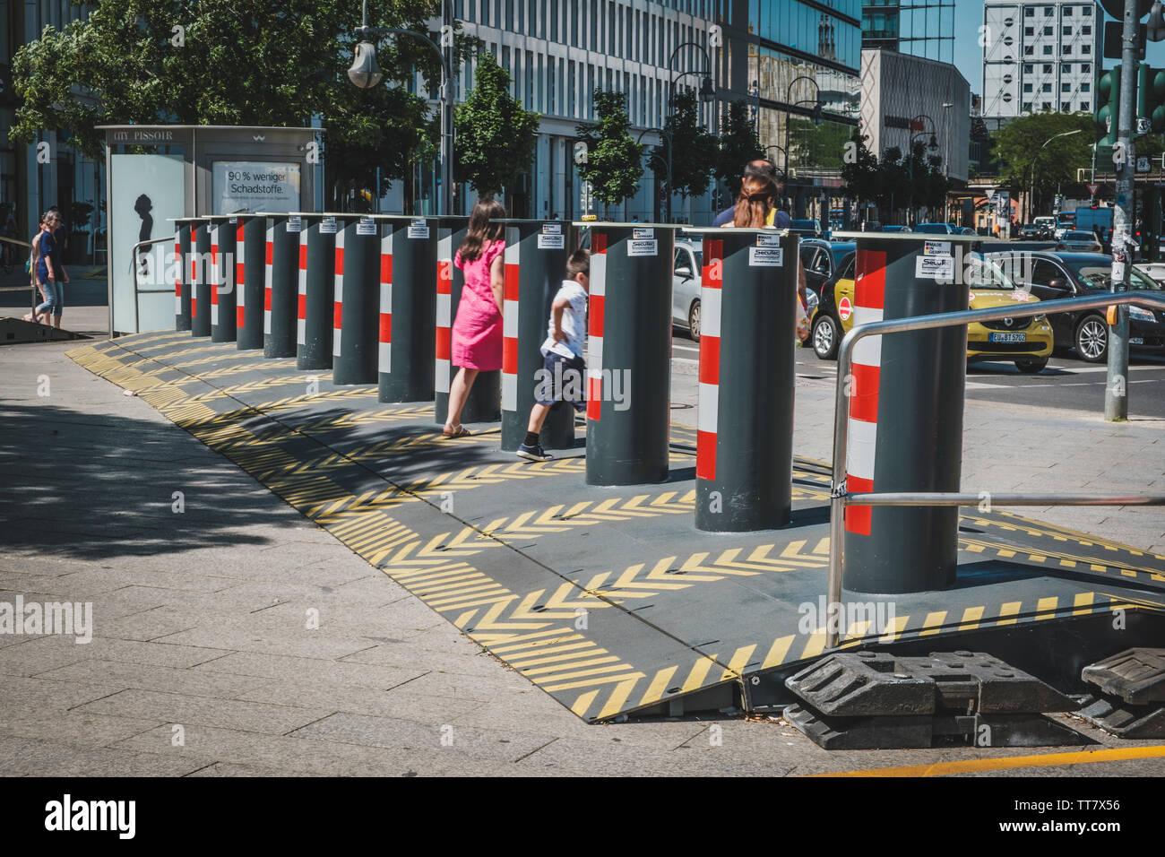 Berlin, Germany - june 2019: Anti terror protection onstreet by barricades or bollards preventing vehicles to drive on sidewalk in Berlin, Germany Stock Photo