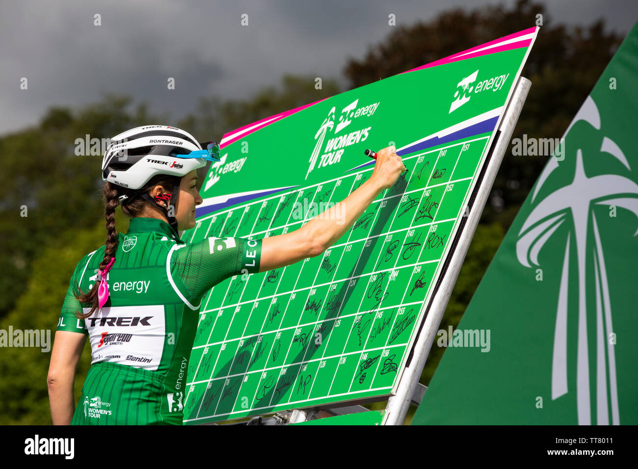 Carmarthen, Wales, UK. 15 June 2019. Lizzie Deignan of the Trek-Segafredo team signs in ahead of the start of Stage 6 of the OVO Energy Women's Tour  Credit: Gruffydd Ll. Thomas Credit: Gruffydd Thomas/Alamy Live News Stock Photo