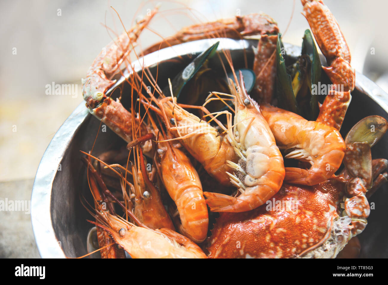 Seafood shellfish with steaming shrimps prawns mussel crab boiled in