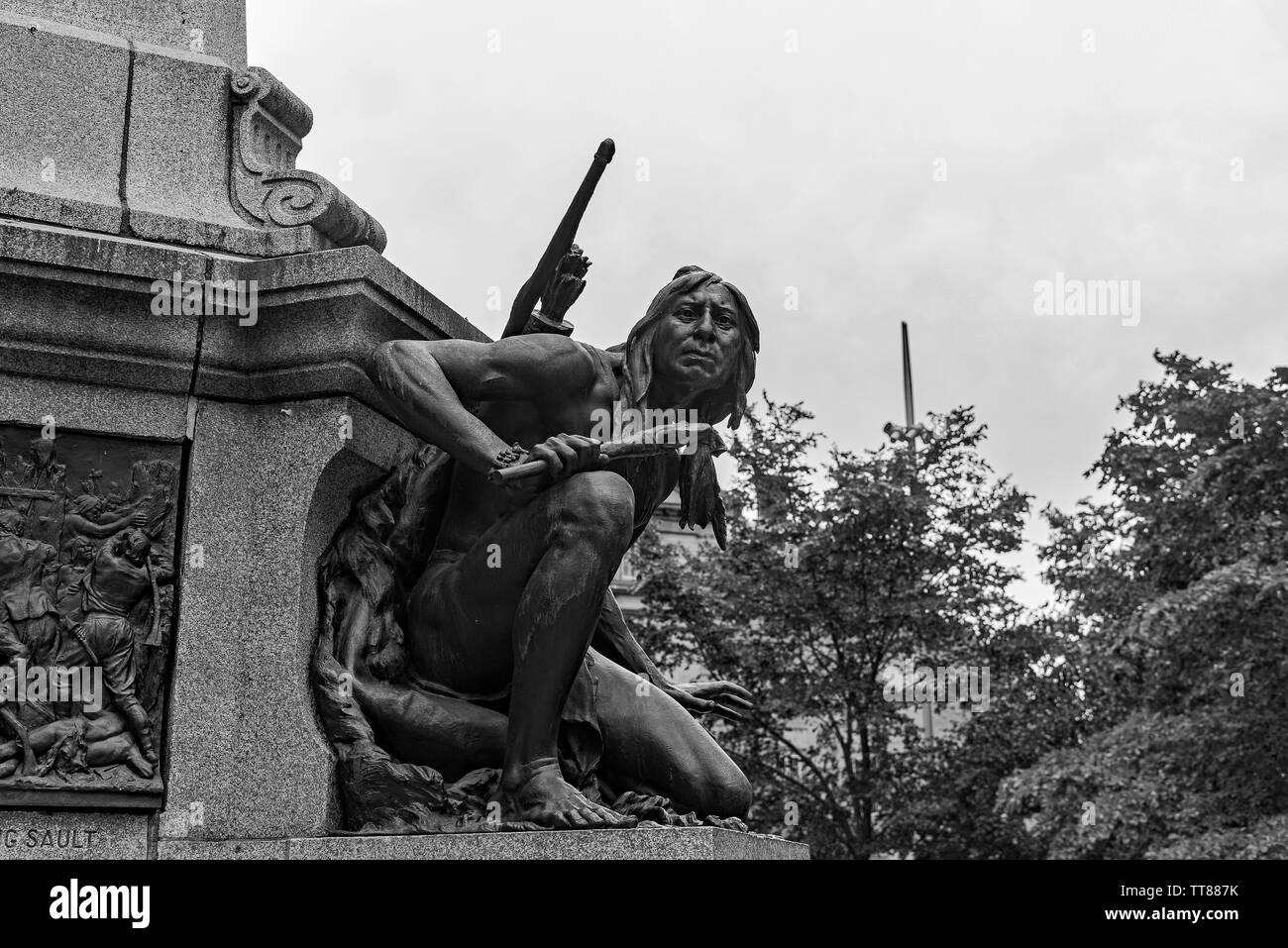 North American Indian Statue on Monument-Old Montreal. Stock Photo