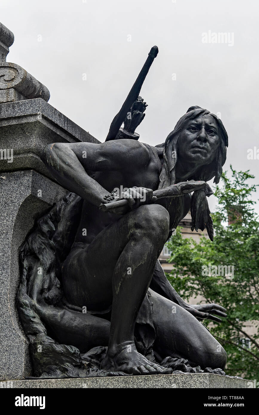 North American Indian Statue on Monument-Old Montreal. Stock Photo