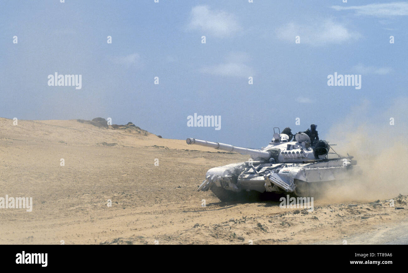 5th November 1993 An Indian T-72 Ajeya (T-72M) Main Battle Tank in white United Nations colours, driving through the desert just south of Mogadishu, Somalia. Stock Photo