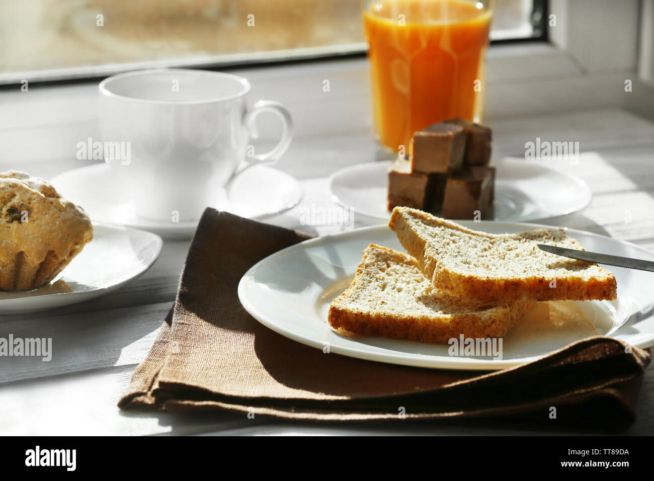 Delicious breakfast on windowsill background Stock Photo