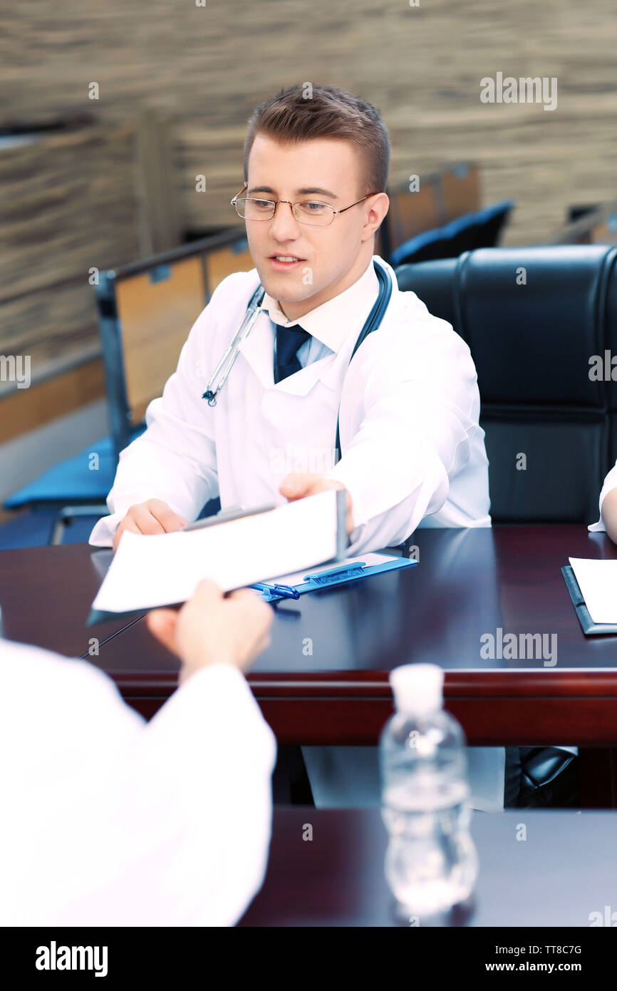 Attractive male doctor hi-res stock photography and images - Alamy