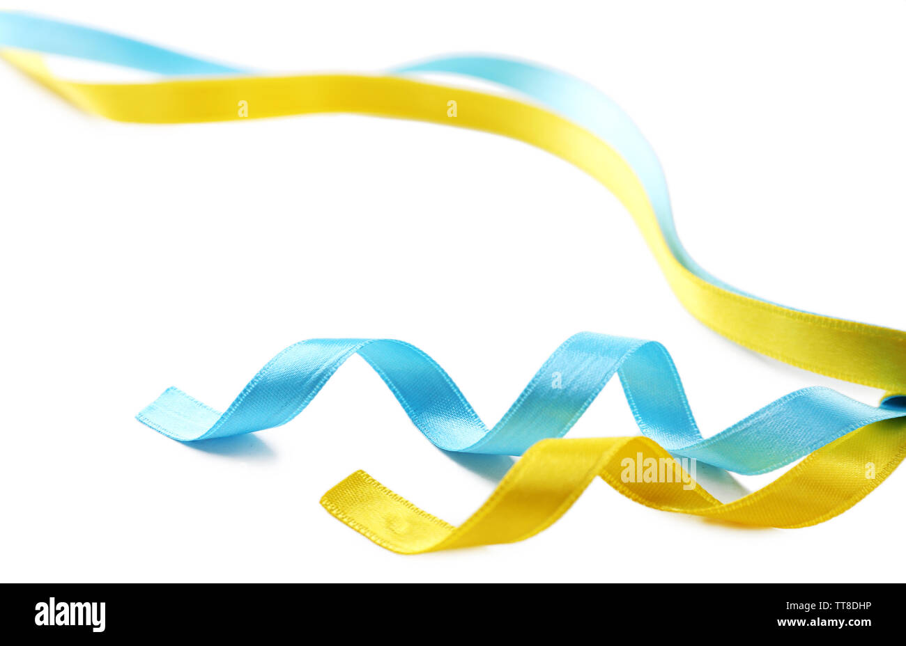 Colorful blue and yellow ribbons isolated on white Stock Photo Alamy