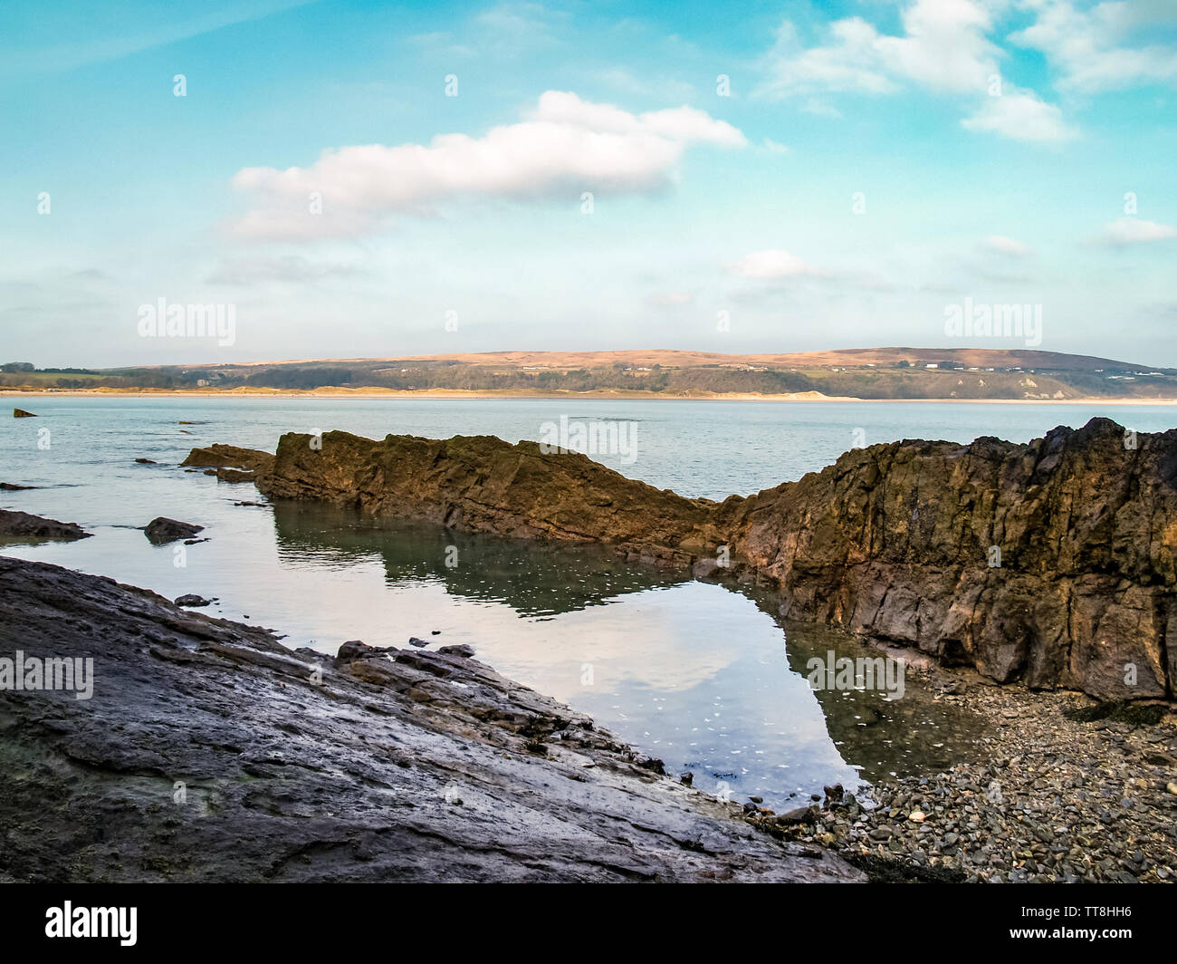 A view from just below Oxwich Wood, looking out over the sea towards Oxwich Bay, Gower, Wales, UK. Stock Photo