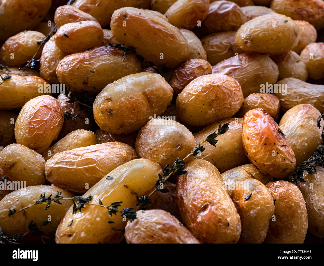 Roasted potatoes, close up Stock Photo - Alamy