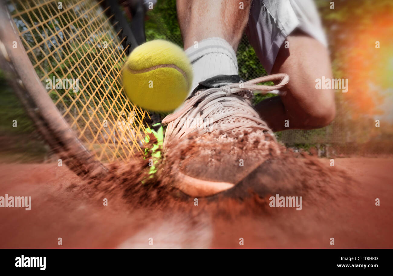 Tennis player on clay tennis court Stock Photo Alamy