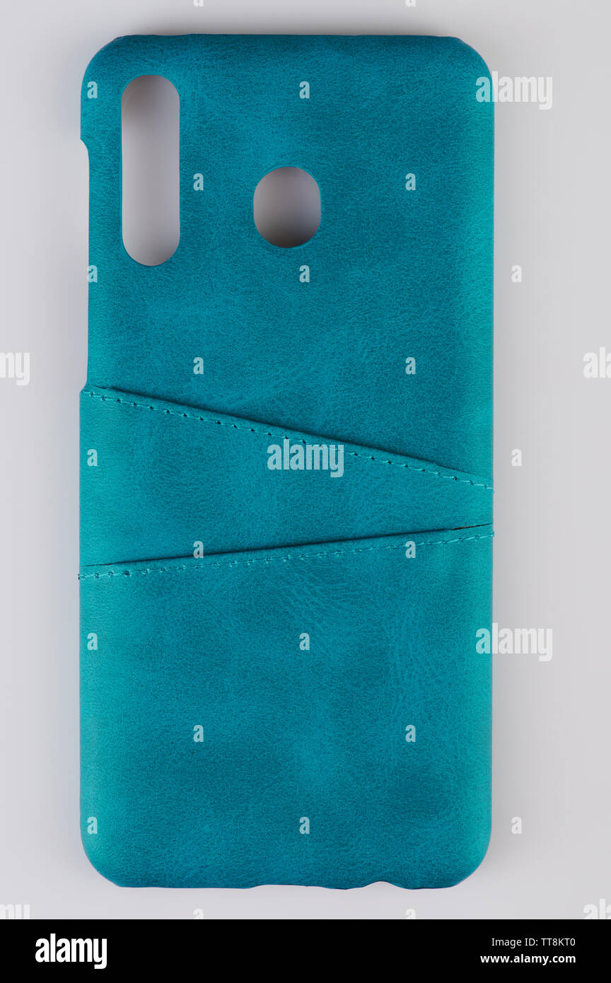 Green leather smartphone case isolated close up view Stock Photo