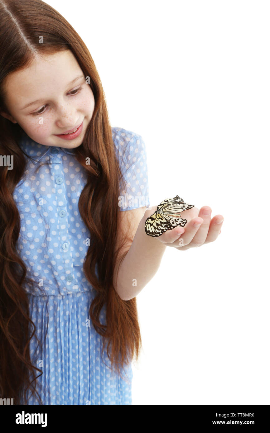 Little girl playing with butterfly, isolated on white Stock Photo