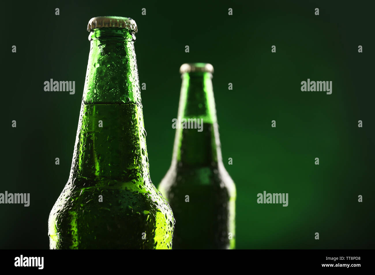 Download Glass Bottles Of Beer On Dark Green Background Stock Photo Alamy Yellowimages Mockups
