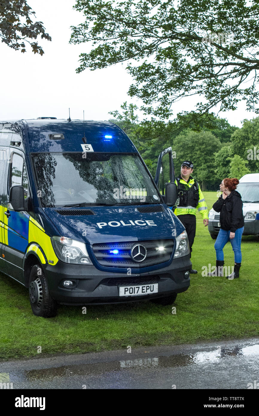 A British police force operational support division; Mercedes-Benz Sprinter 519 CDI vehicle, demonstration with riot gear protection clothing Stock Photo