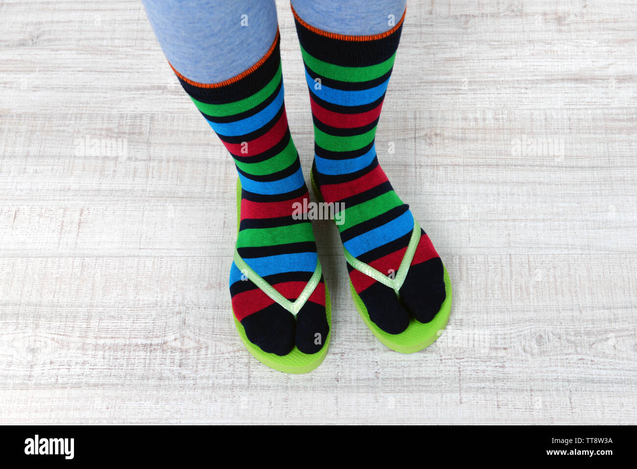 Woman feet in multicolored striped socks stock photo (160474) -  YouWorkForThem
