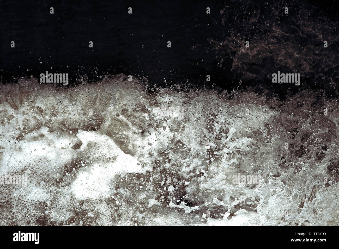 Water splash in black and white. Darkness ans shadow. Water in dynamic ...