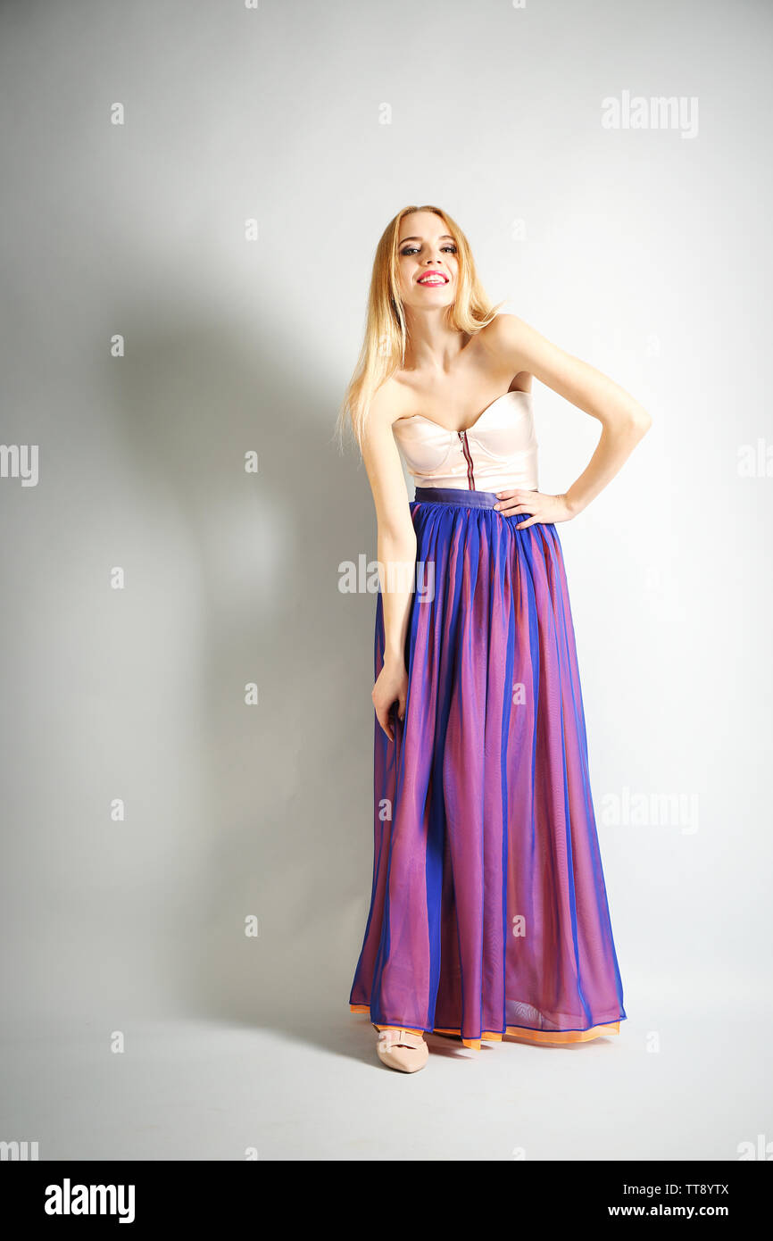 Expressive Model Expressive young model on gray background Stock Photo - Alamy
