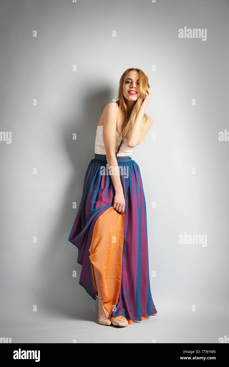 Expressive Model Expressive young model on gray background Stock Photo - Alamy