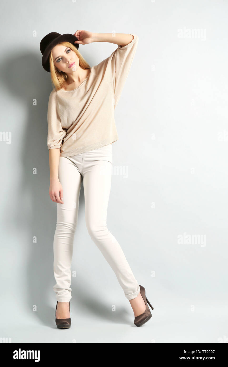 Expressive Model Expressive young model on gray background Stock Photo - Alamy