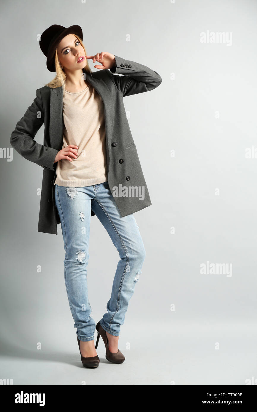 Expressive Modeling Expressive young model on gray background Stock Photo - Alamy