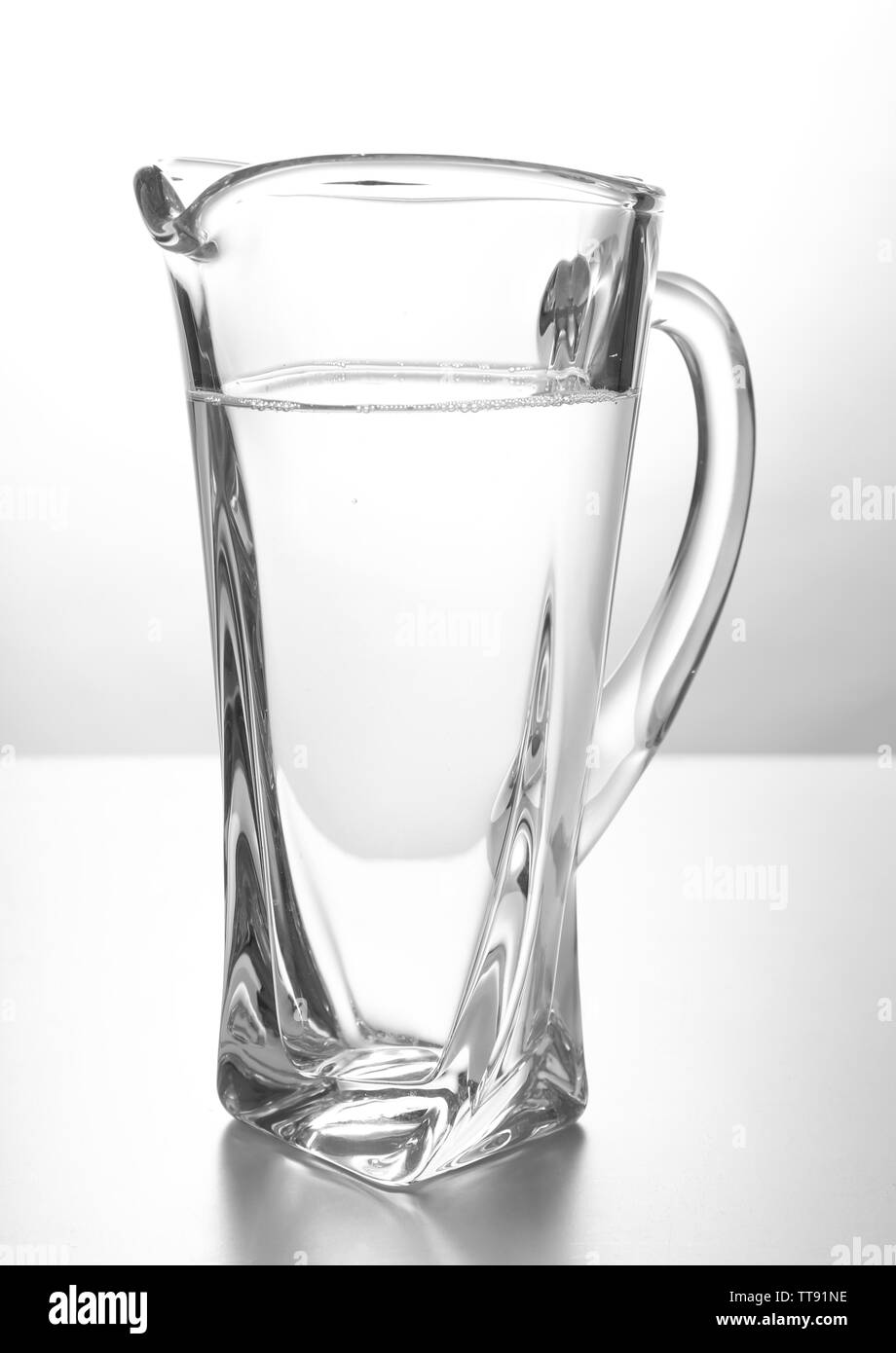 Glass pitcher of water isolated on white Stock Photo Alamy