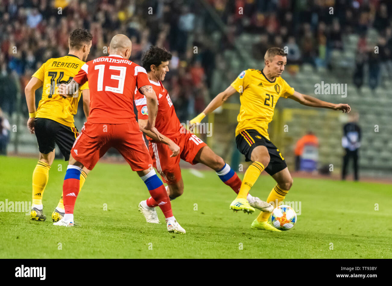 Brussels, Belgium - March 21, 2019. Belgium national football team players Dries Mertens and Timothy Castagne against Russia players Fedor Kudryashov Stock Photo