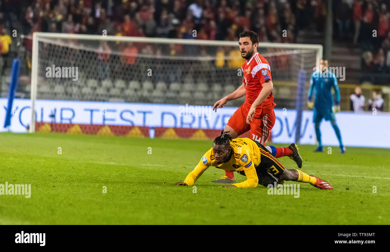 Brussels, Belgium - March 21, 2019. Belgium national football team striker Michy Batshuayi against Russia defender Georgi Dzhikiya during UEFA Euro 20 Stock Photo