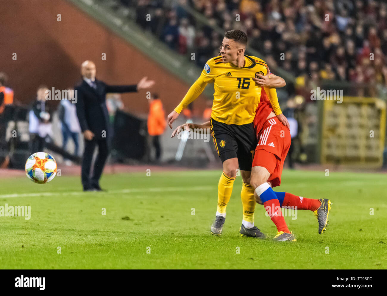 Brussels, Belgium - March 21, 2019. Belgium national football team midfielder Thorgan Hazard and Russia national team defender Mario Fernandes during Stock Photo