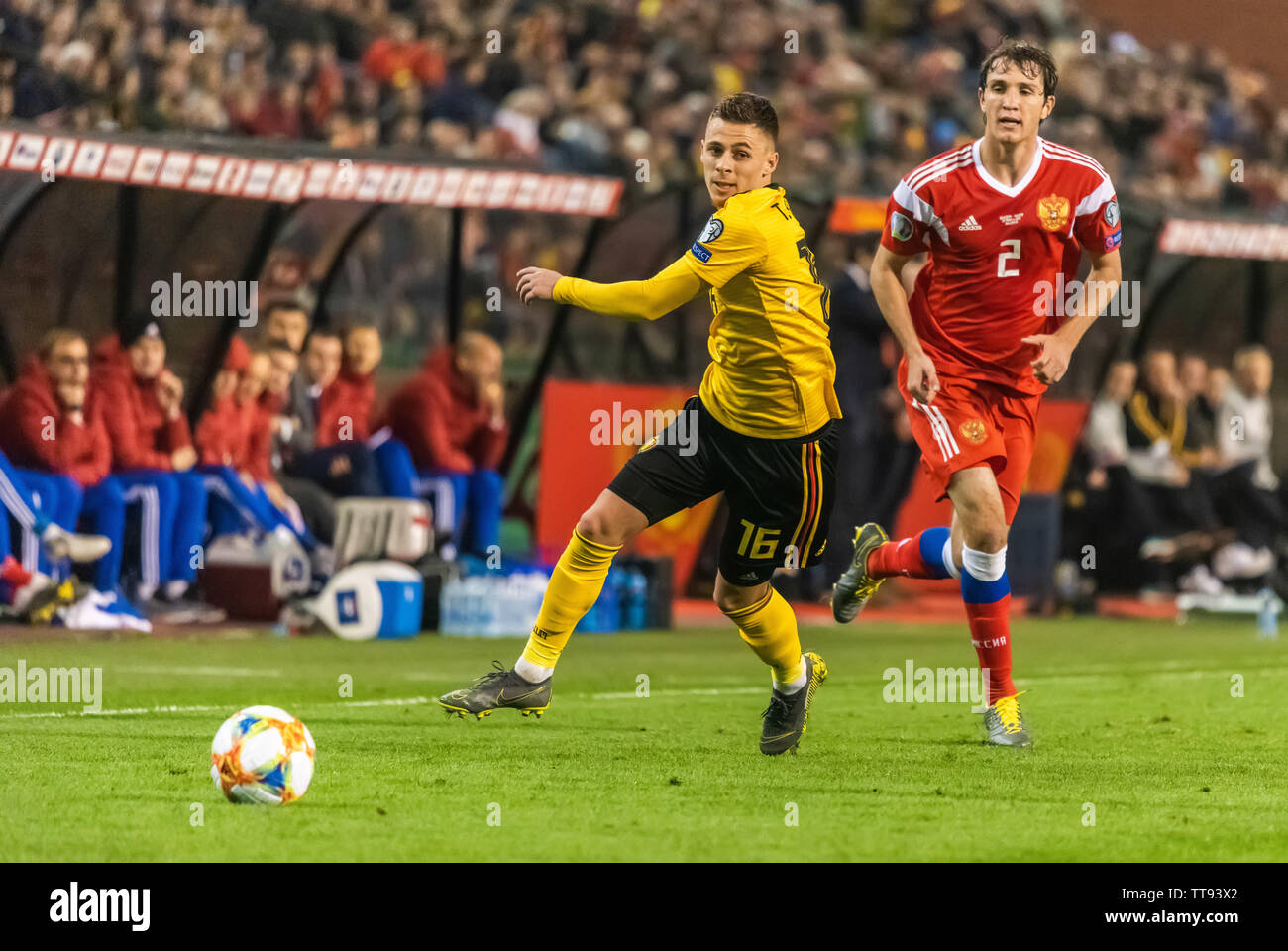Brussels, Belgium - March 21, 2019. Belgium national football team midfielder Thorgan Hazard and Russia national team defender Mario Fernandes during Stock Photo