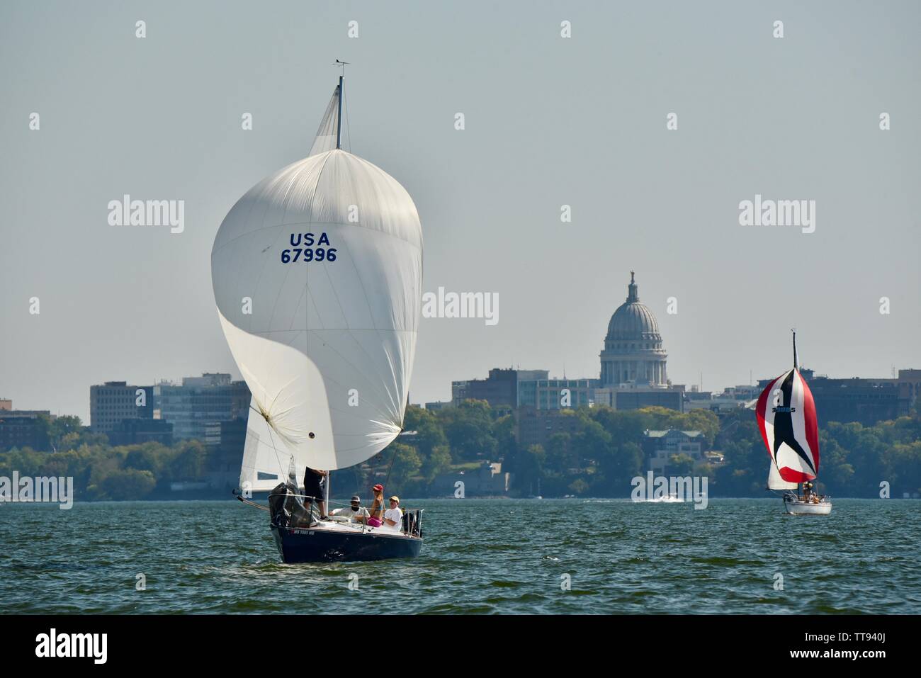Sailing on Lake Mendota, with spinnaker up to catch the wind, with