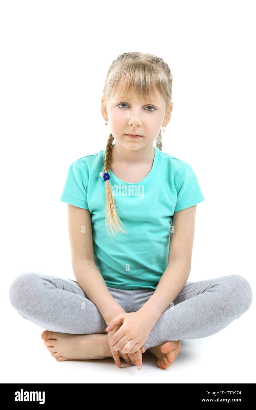 Little girl doing exercises isolated on white Stock Photo - Alamy