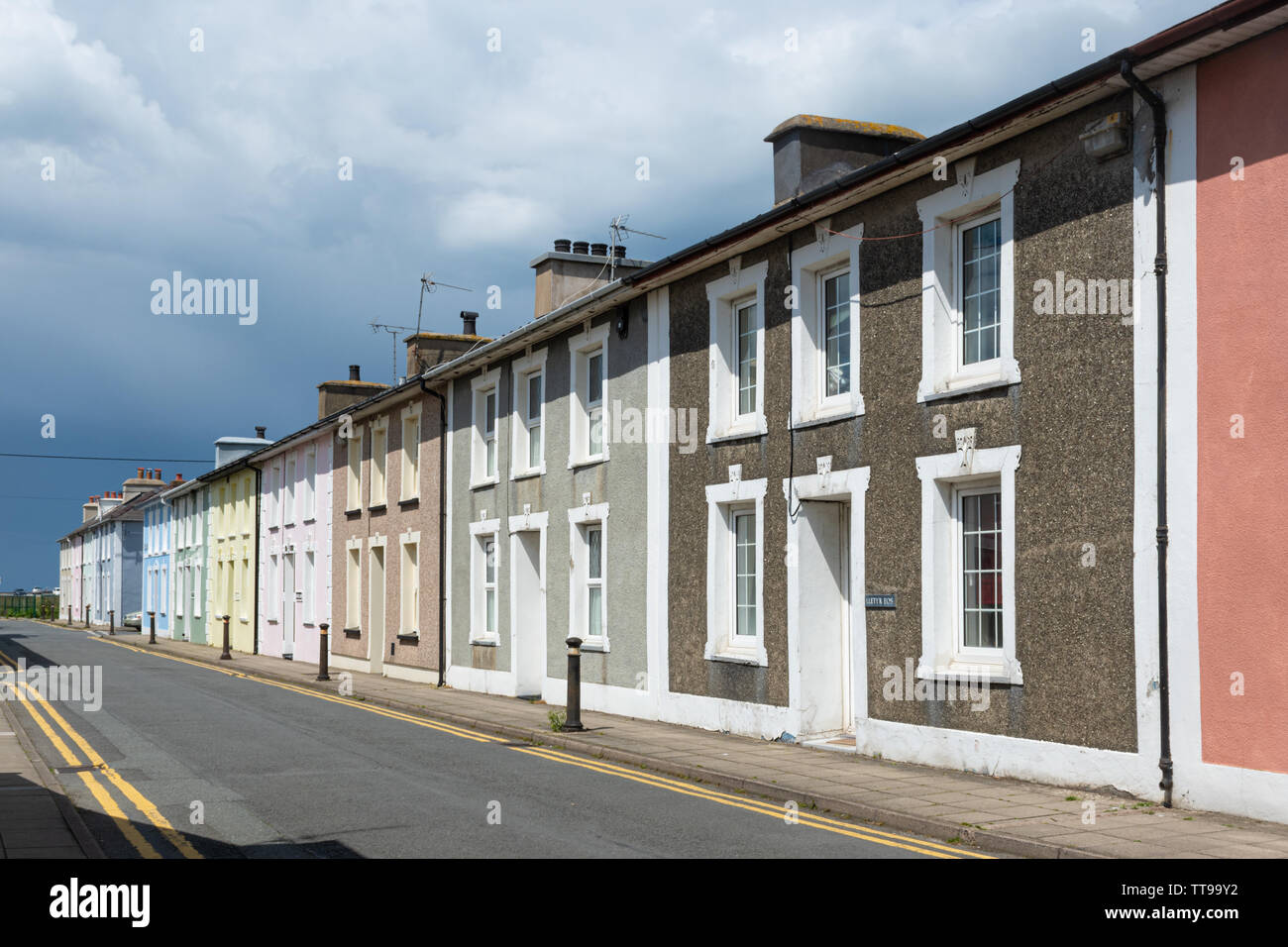 The picturesque Georgian town of Aberaeron on the Cardigan Bay coast in Ceredigion, Wales, UK, with brightly painted town houses. Stock Photo