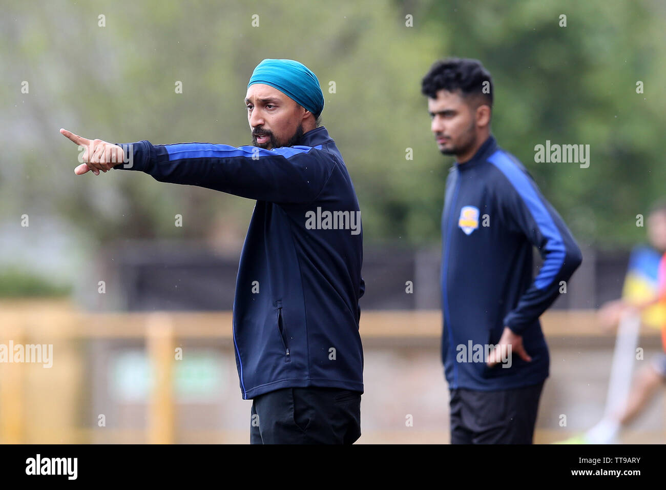 Barry, UK. 15th June, 2019. Manraj Singh Sucha, the manager of Panjab FA football team. Barry Town United v Panjab FA, football friendly match at Jenner Park in Barry, South Wales on Saturday 15th June 2019. Barry Town are using the match as preparation for their forthcoming European matches. The Panjab FA team are playing their 1st ever game in South Wales. pic by Andrew Orchard/Andrew Orchard sports photography/Alamy Live news Credit: Andrew Orchard sports photography/Alamy Live News Stock Photo