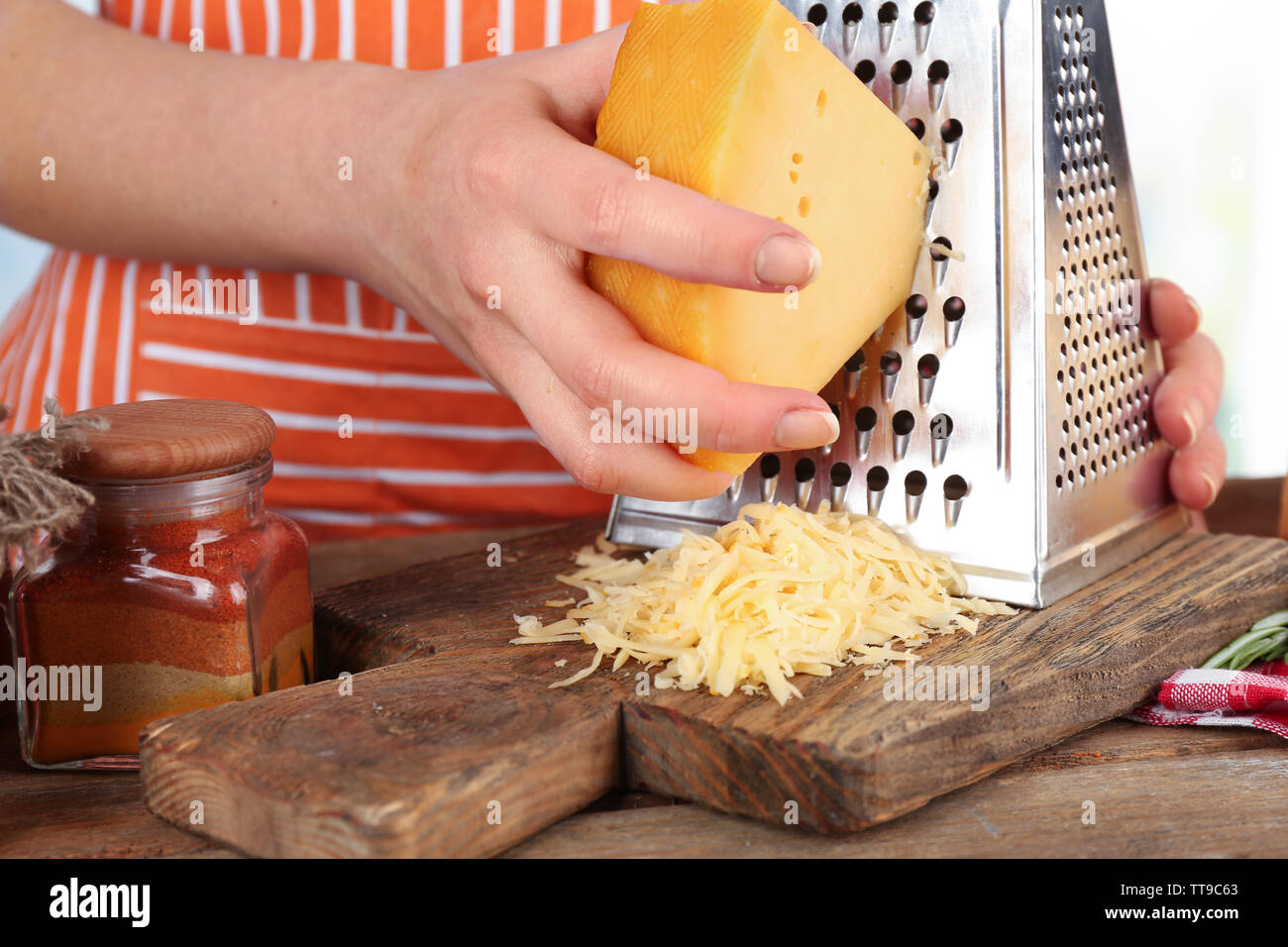 Grating the cheese hires stock photography and images Alamy