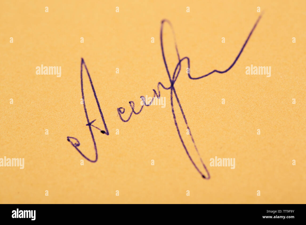 Signature on paper background Stock Photo