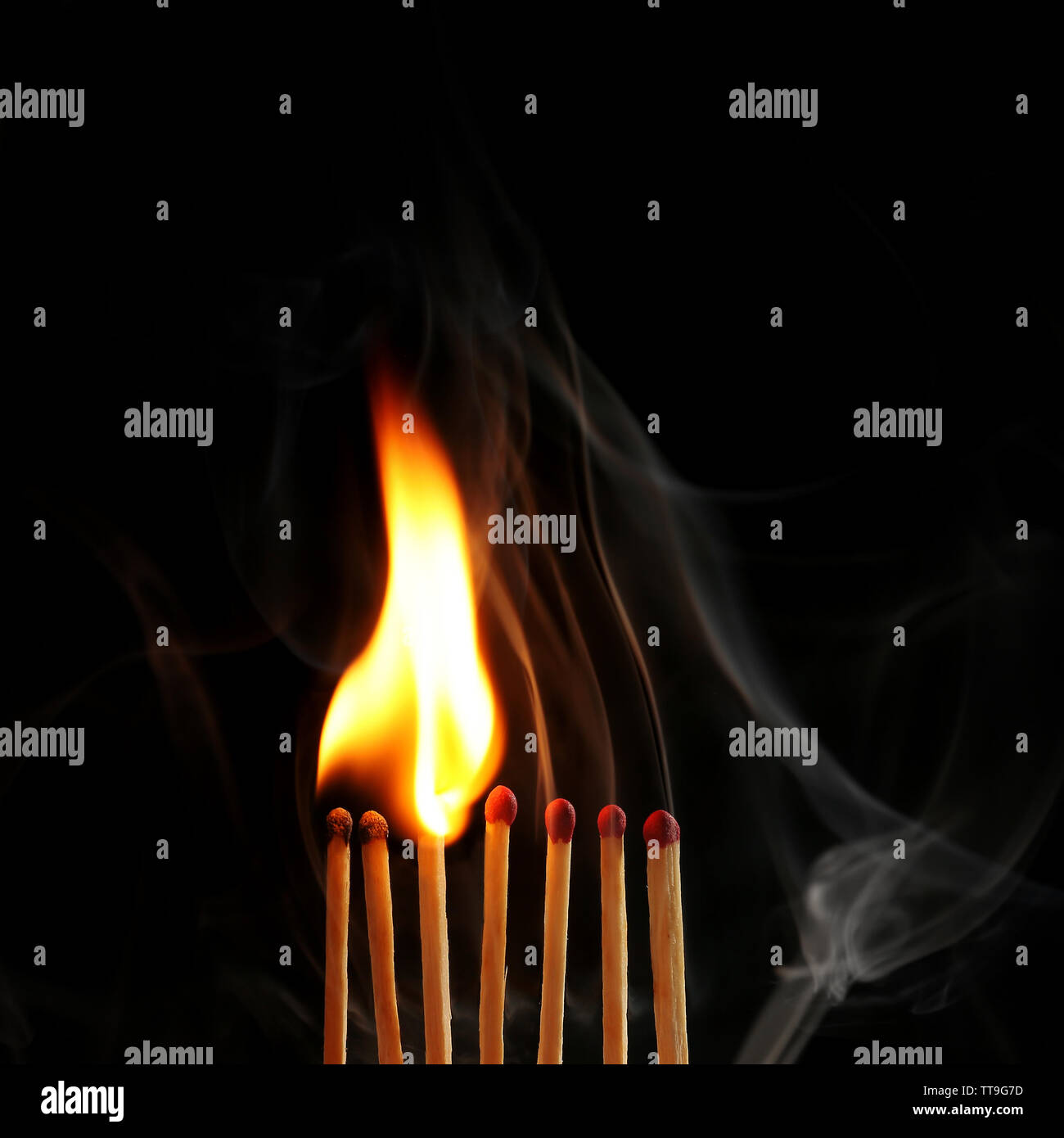 Burning matches in smoke on black background Stock Photo Alamy
