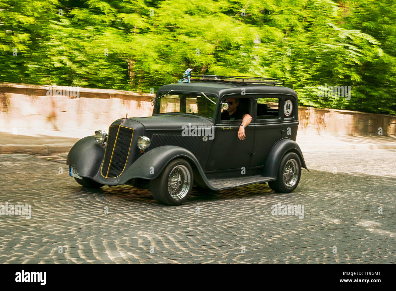 Lviv, Ukraine - June 2, 2019: Old retro car PLYMOUTH SPECIAL (1933) with its owner and  unknown passenger taking participation in race Leopolis grand Stock Photo