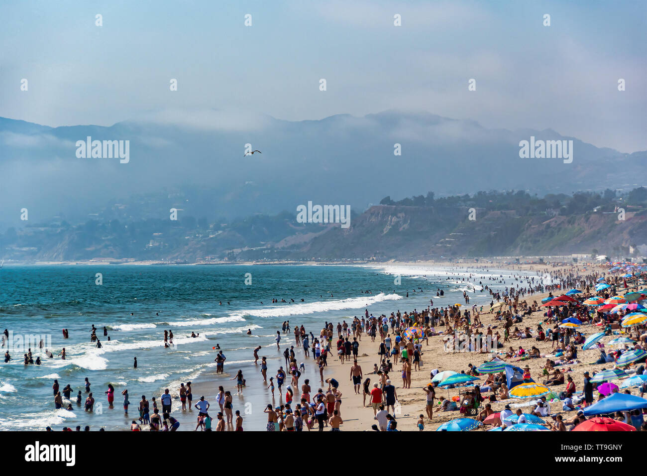 Santa Monica, CA, USA - July 27, 2018 - People enjoying nice sunny weather on the beach in Santa Monica, CA, USA, on July 27, 2018. Stock Photo