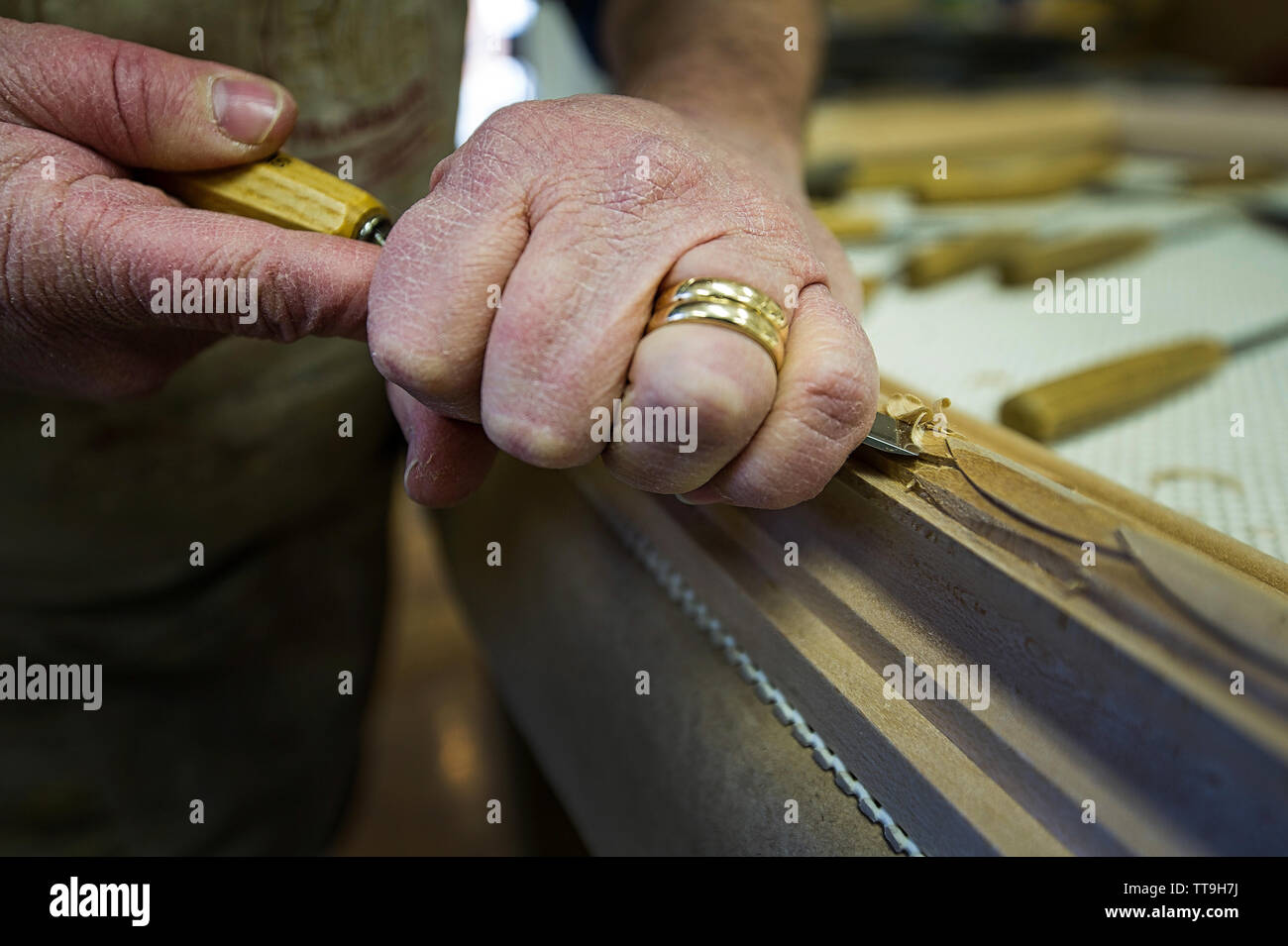 UNITED STATES - MARCH 02: Peter H. Miller, frame maker and owner of P.H. Miller Studio works in his studio in Berryville Virginia. Miller is widely kn Stock Photo