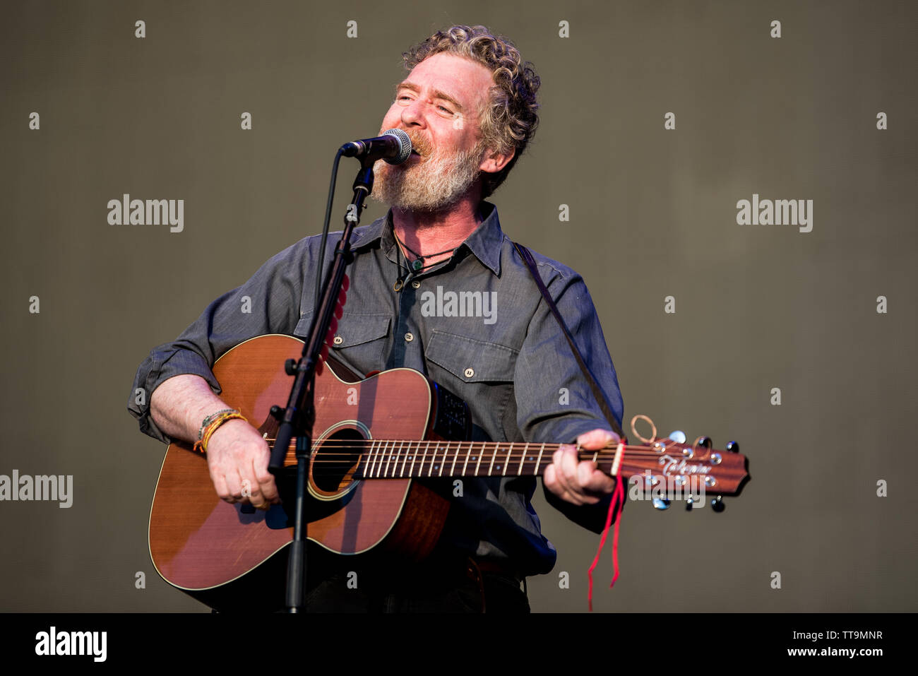 The irish singer Glen Hansard performing live on stage at the Firenze Rocks festival 2019 in Florence, Italy, opening for Eddie Vedder Stock Photo