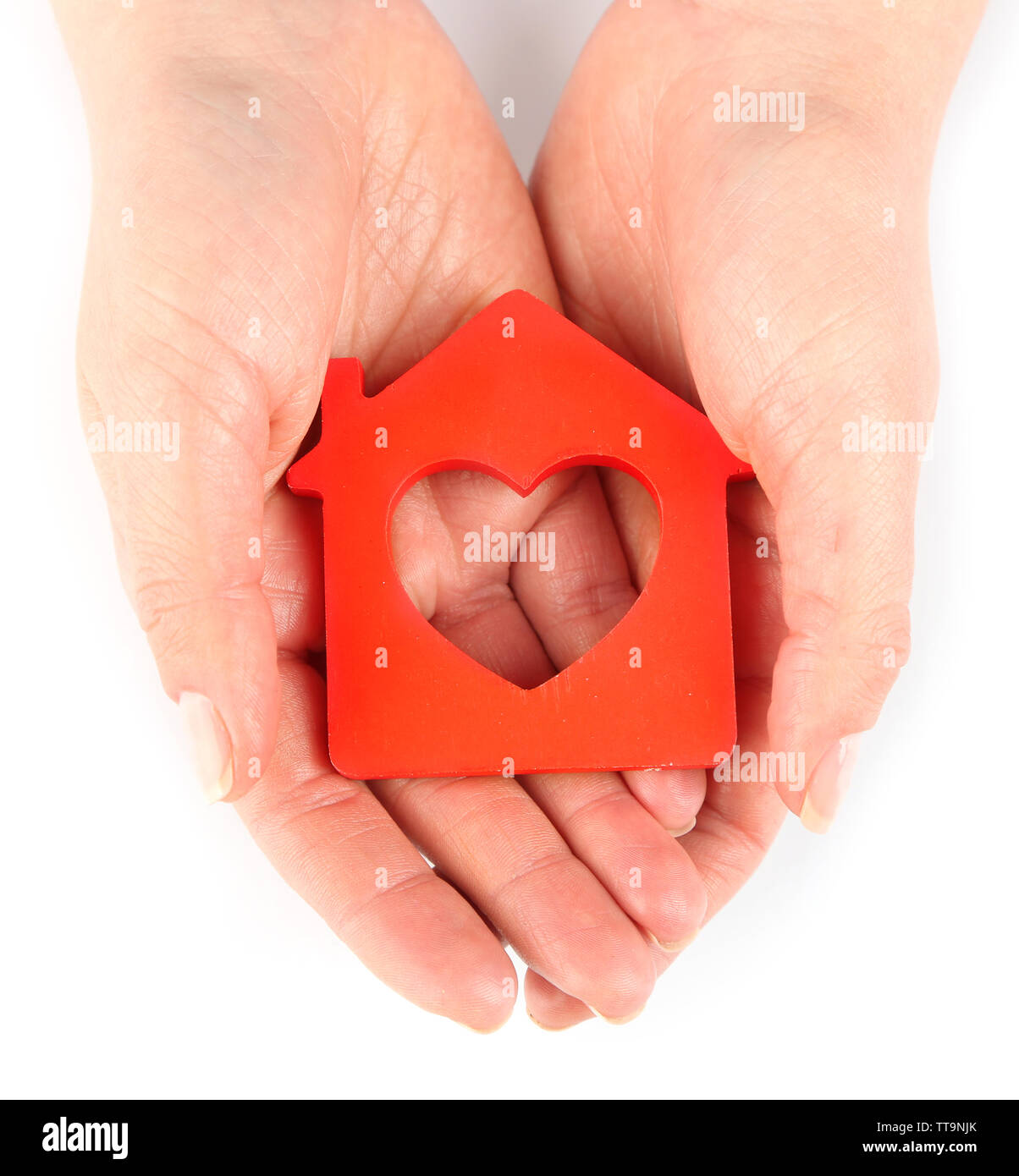 Female hands with model of house isolated on white Stock Photo - Alamy
