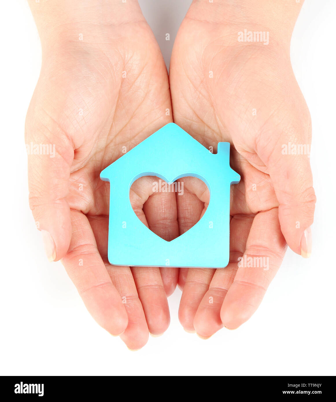 Female hands with model of house isolated on white Stock Photo - Alamy