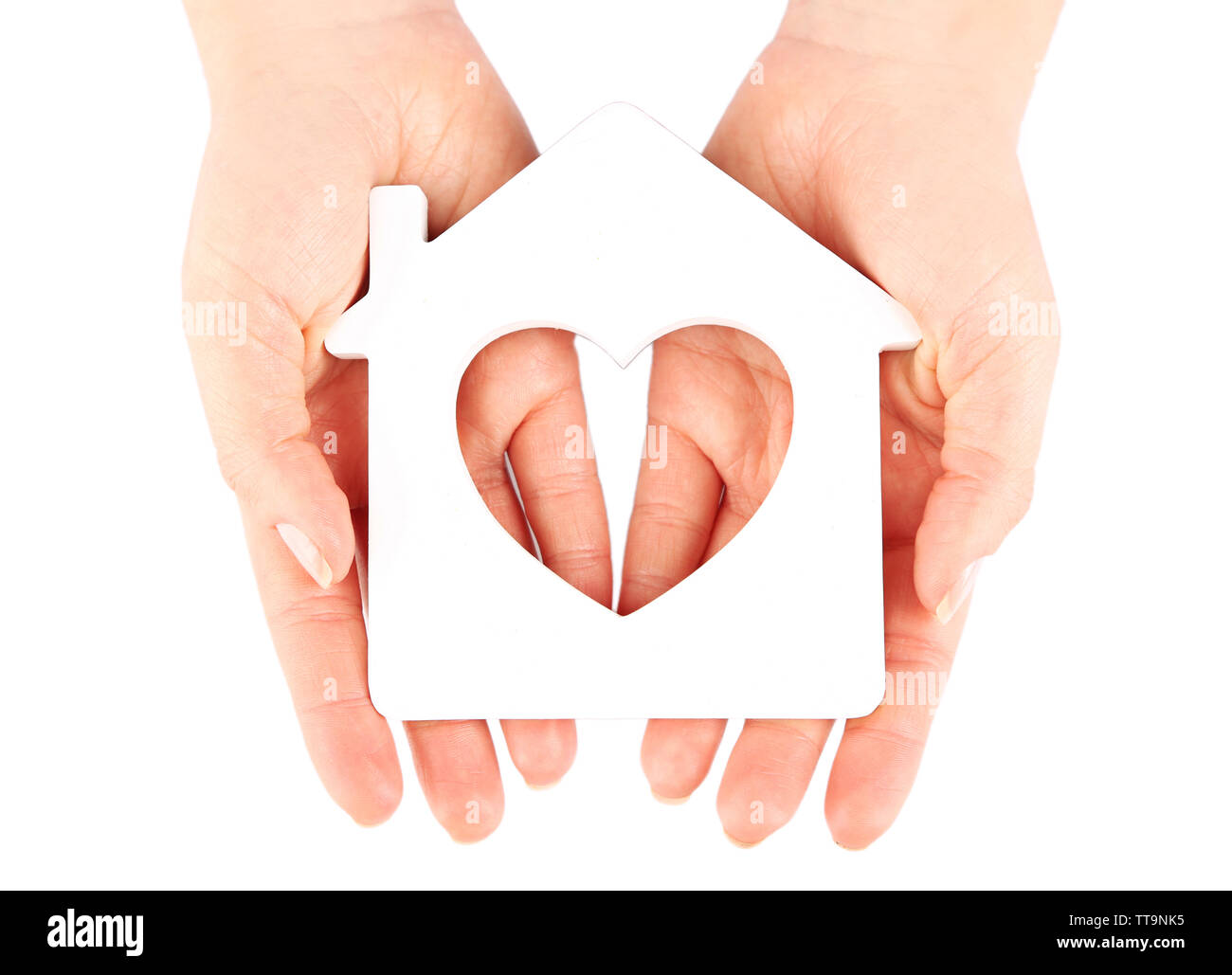 Female hands with model of house isolated on white Stock Photo - Alamy