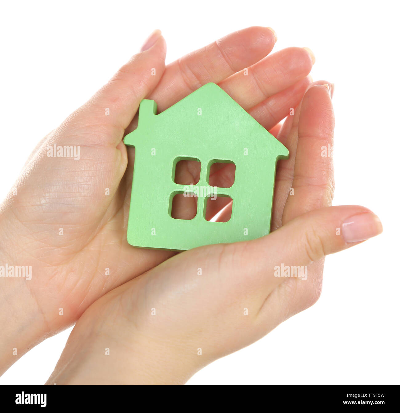 Female hands holding model of house isolated on white Stock Photo - Alamy