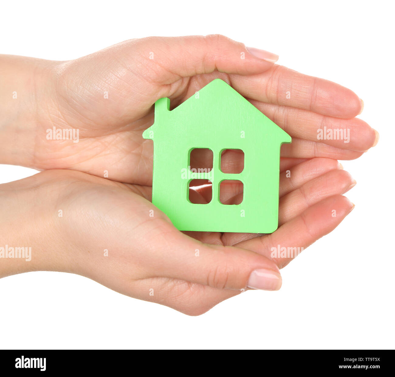 Female hands holding model of house isolated on white Stock Photo - Alamy
