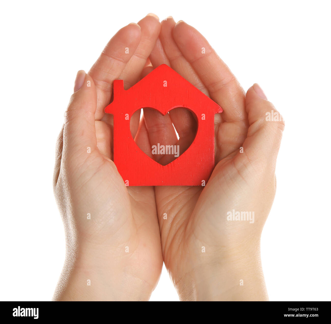 Female hands holding model of house isolated on white Stock Photo - Alamy