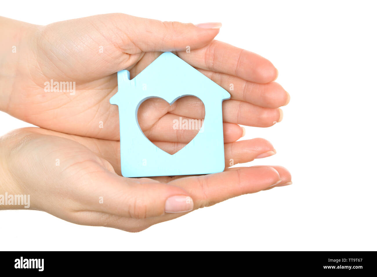 Female hands holding model of house isolated on white Stock Photo - Alamy