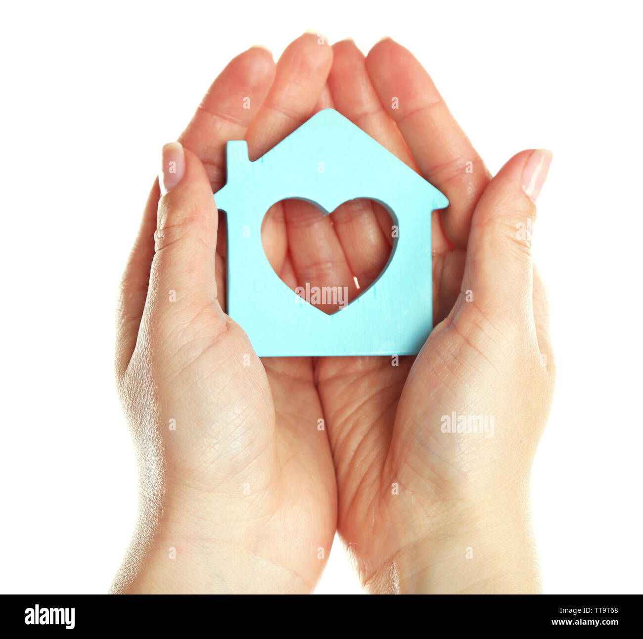 Female hands holding model of house isolated on white Stock Photo - Alamy