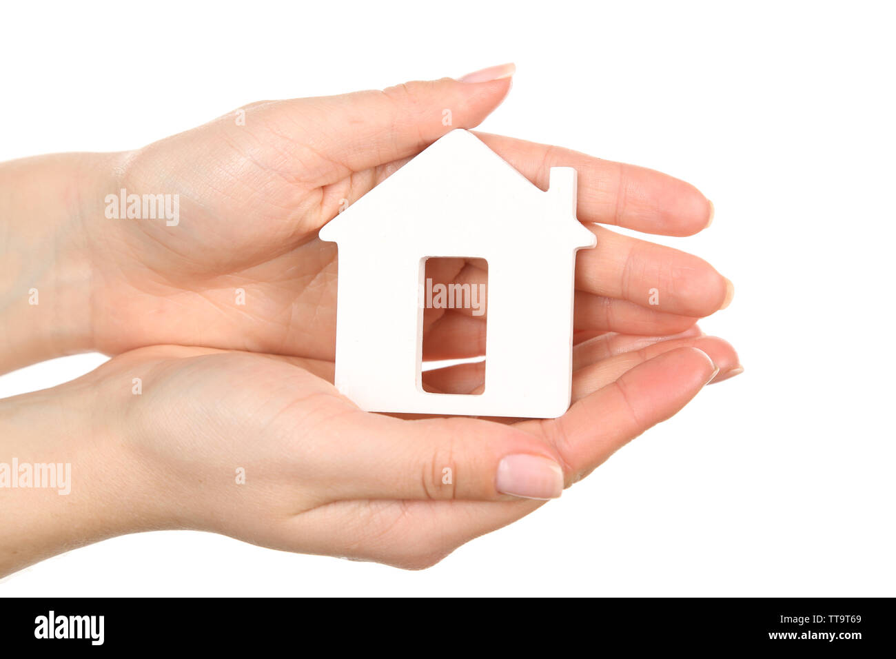 Female hands holding model of house isolated on white Stock Photo - Alamy
