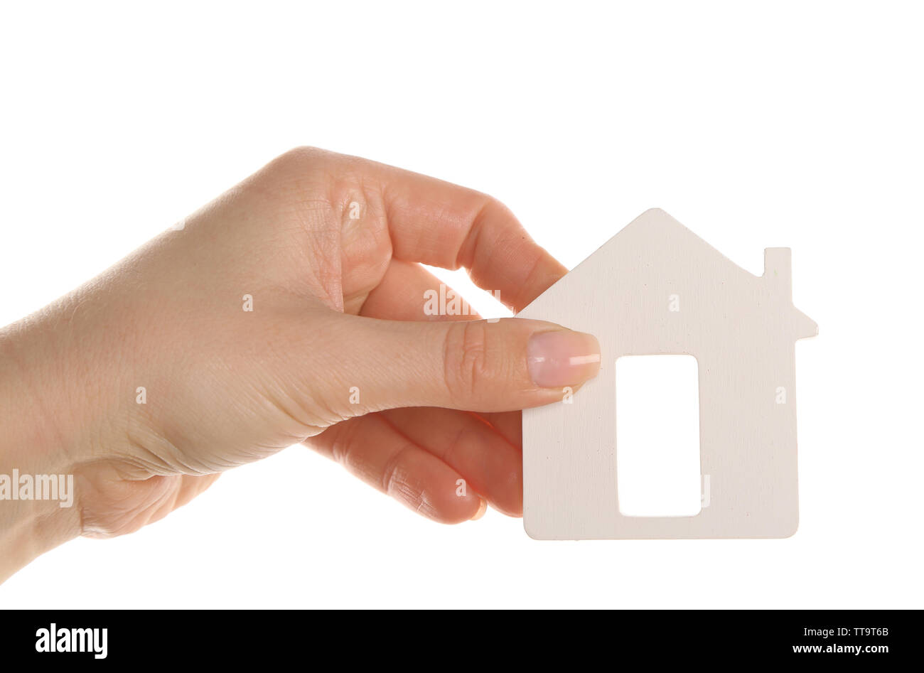 Female hand holding model of house isolated on white Stock Photo - Alamy
